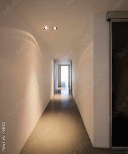 Trick of light in white corridor