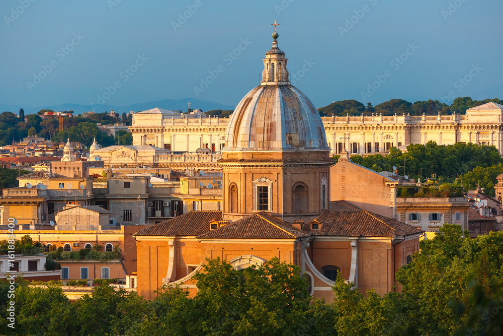 Aerial wonderful view of Rome with San Giovanni dei Fiorentini church at sunset time in Rome, Italy