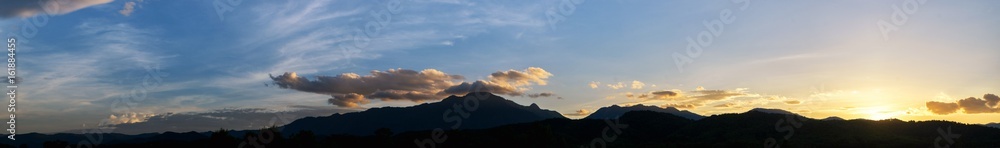 Silhouette mountain at time sunset background.
