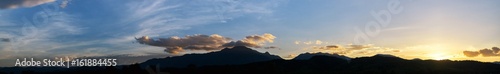 Silhouette mountain at time sunset background. © NewSaetiew