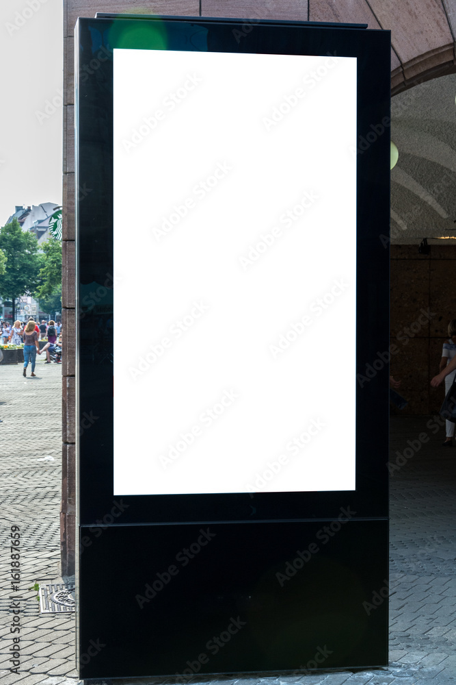 Black blank ad space sign isolated in the street Black blank ad space sign isolated in the street