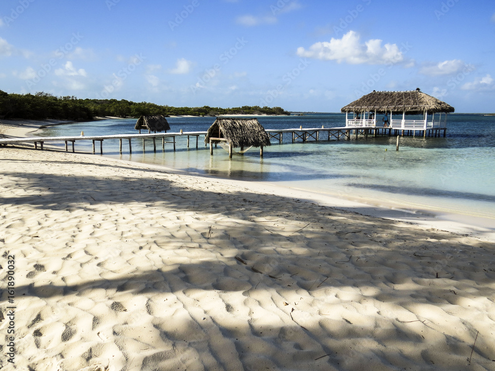 Paradise beach in Cayo Santa Maria, Cuba. View of a perfect desert coast with white sand and blue turquoise sea. Paradise beach in Cayo Santa Maria, Cuba. View of a perfect desert coast with white sand and blue turquoise sea.