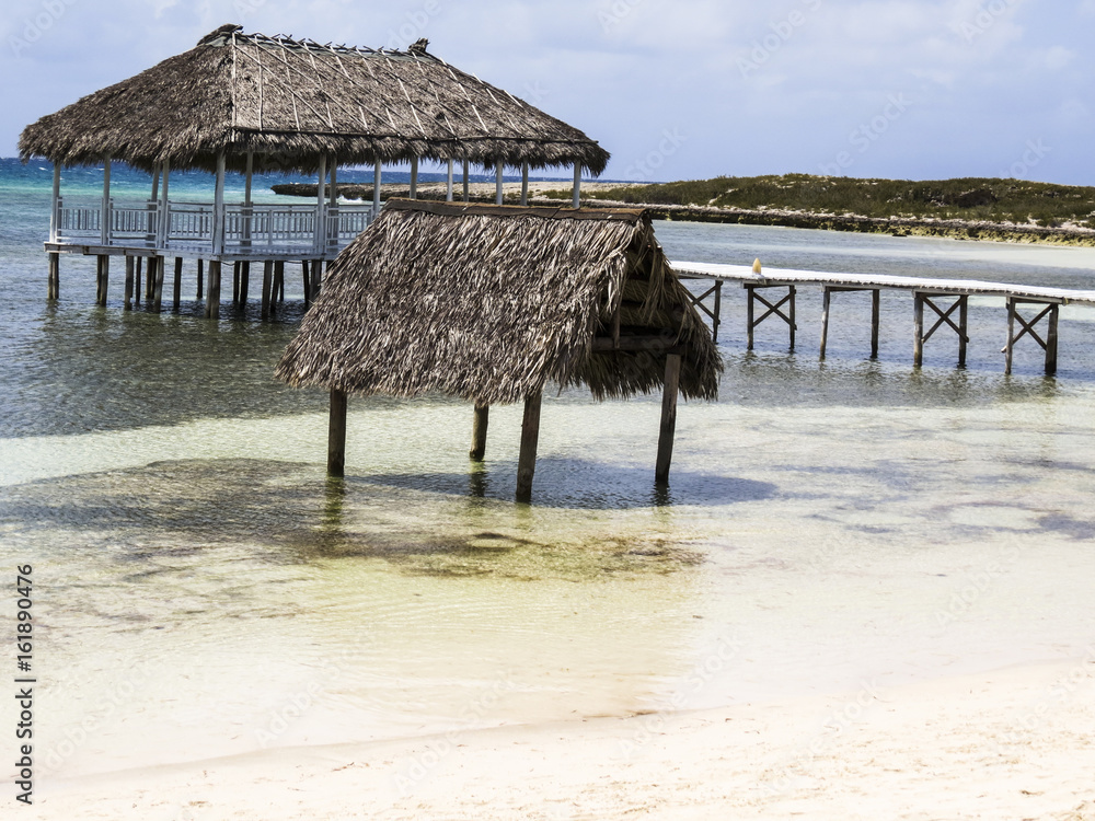 Paradise beach in Cayo Santa Maria, Cuba. View of a perfect desert coast with white sand and blue turquoise sea. Paradise beach in Cayo Santa Maria, Cuba. View of a perfect desert coast with white sand and blue turquoise sea.