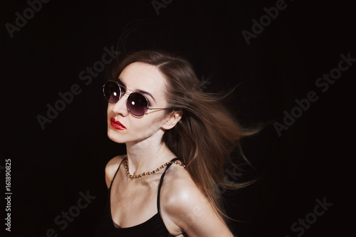 Young woman wearing a sunglasses