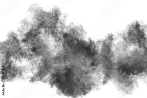 abstract powder splatted on white background,Freeze motion of black powder exploding.