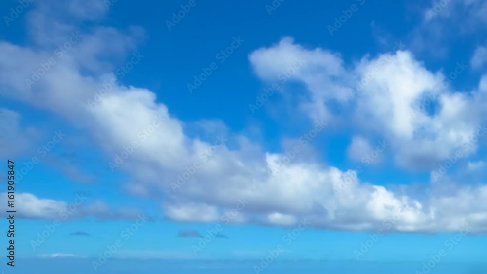Hawaiian blue cloudy sky with moving clouds time lapse in 4K from Hanauma Bay Nature Preserve, Oahu island, Hawaii, United States in summer time. Hawaiian blue cloudy sky with moving clouds time lapse in 4K from Hanauma Bay Nature Preserve, Oahu island, Hawaii, United States in summer time.