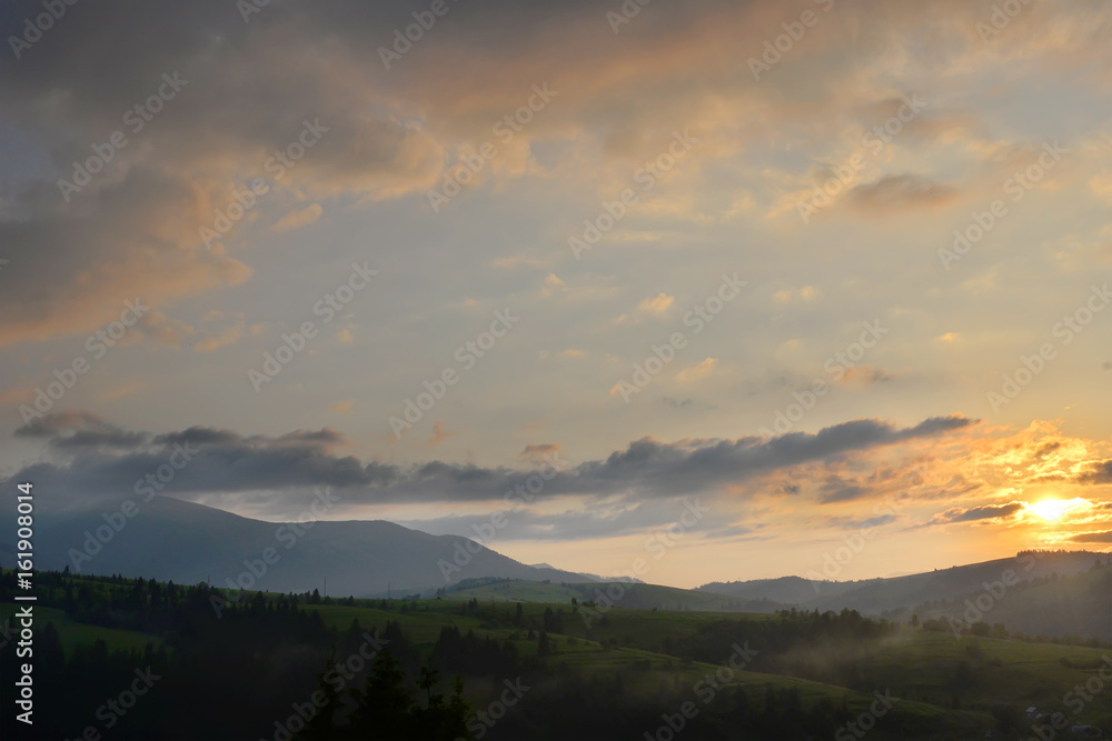 Obraz premium Mountain landscape at sunset