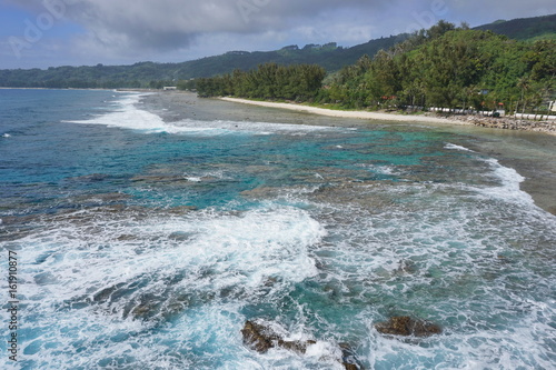 Coastal landscape the seashore near the village of Moerai on the island of Rurutu, Austales archipelago, south Pacific ocean, French Polynesia photo