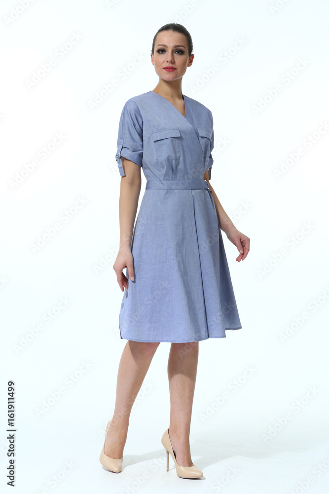 indian business woman in summer blouse and trousers and high heel shoes full body photo isolated on white