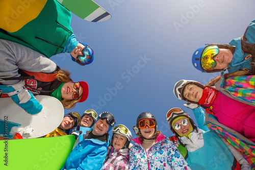 Group of people, Snowboarders and Skiers Posing and smiling outdoor. Winter mountain holiday, Ski resort, winter sport