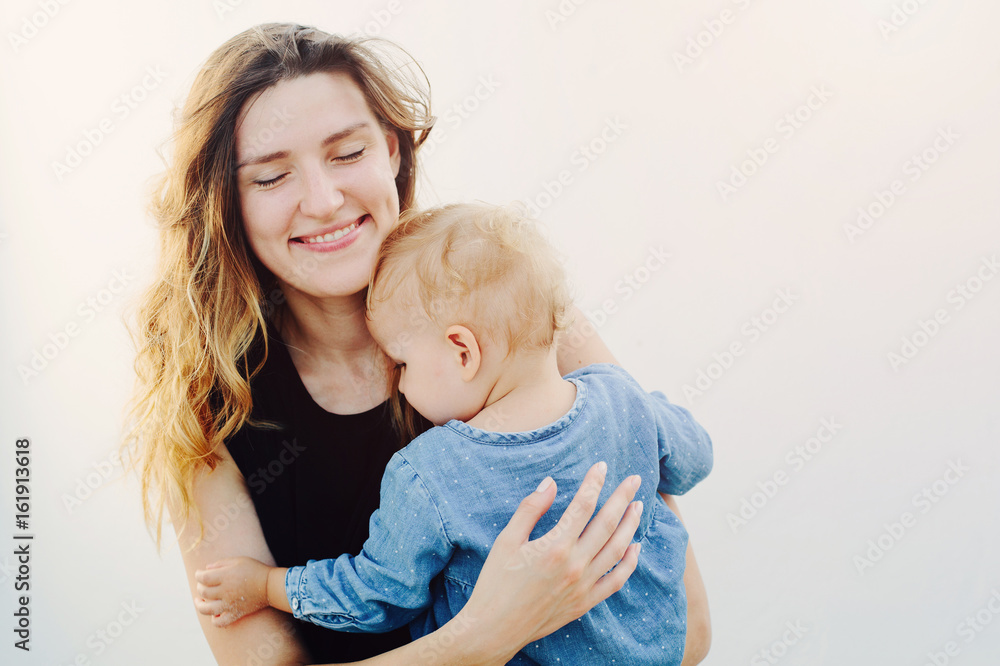 Happy Mother holding sweet baby Girl Happy Mother holding sweet baby Girl