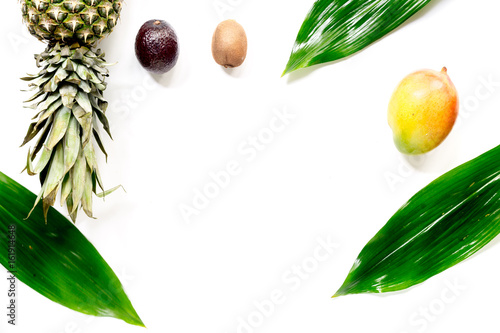 Exotic fruits food concept. Mangosteen, mango, kiwi, pineapple on white background top view copyspace