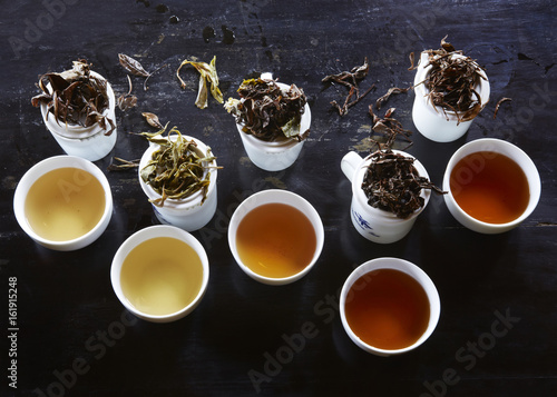 Specialist tea leaves and cups photo