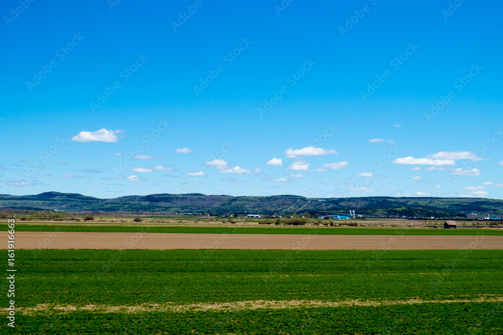 Bright countryside landscape in The Province of Quebec during a wonderful sunny day.