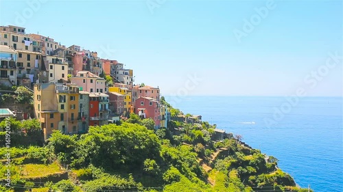 Beautiful view of old village from above in Cinque Terre. One of five famous colorful villages of National Park in Italy photo