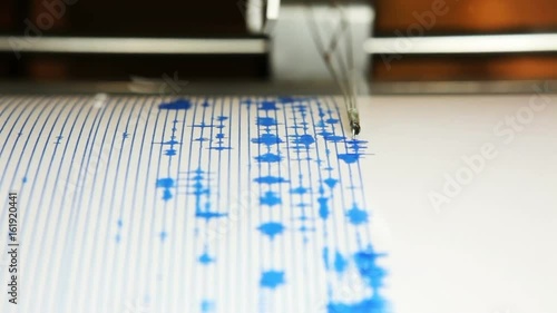 A seismograph machine actively recording ground tremors, Mount St Helens, Johnston Ridge Observatory, Washington photo