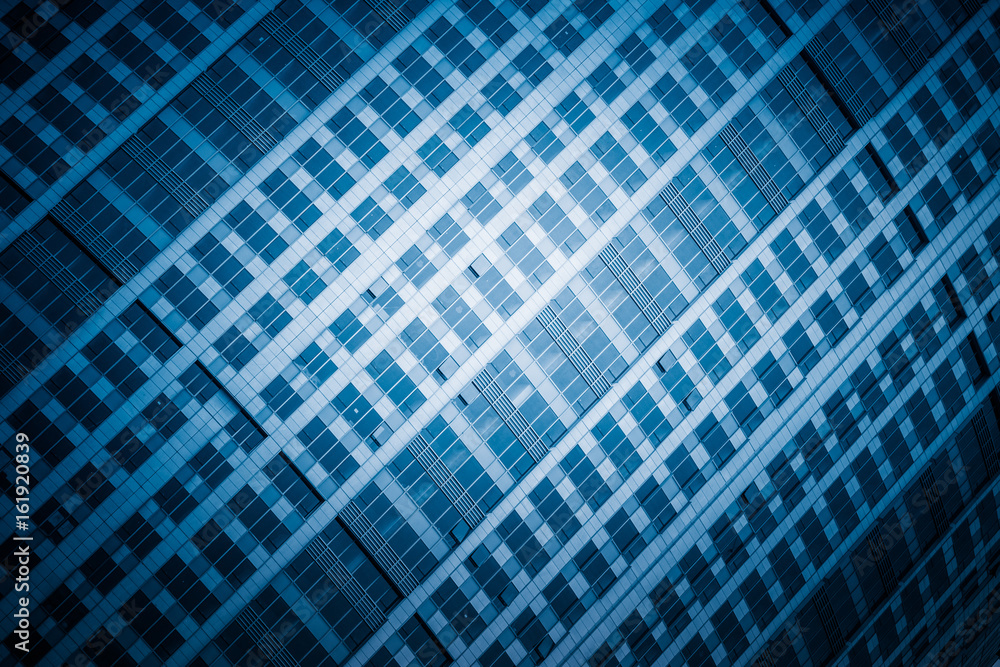 detail shot of modern architecture facade,business concepts in blue tone,shot in city of China.