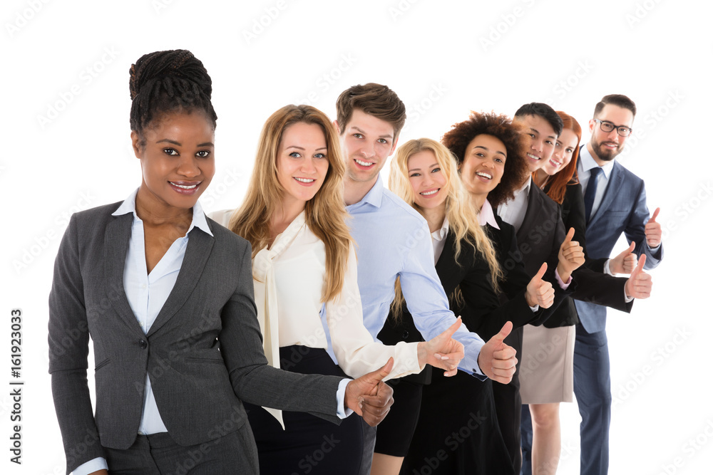 Confident Businesspeople Gesturing Thumbs Up Confident Businesspeople Gesturing Thumbs Up
