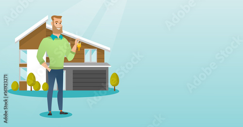 Young caucasian homeowner with key.