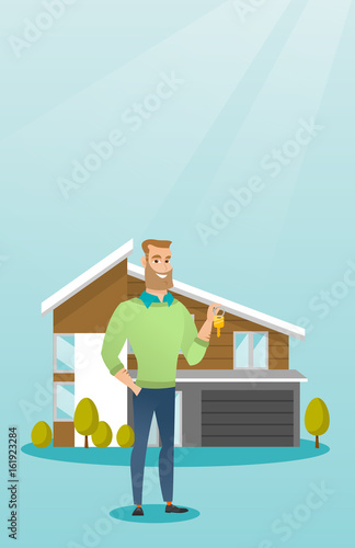 Young caucasian homeowner with key.