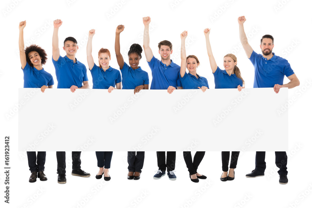 Obraz premium Happy Multiracial Janitors With Banner