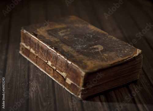 An Antique Broken Book on a Table, Possibly a Bible © pamela_d_mcadams