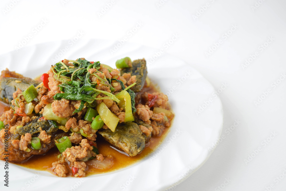stir fired minced pork with basil top on fired preserved egg. stir fired minced pork with basil top on fired preserved egg.