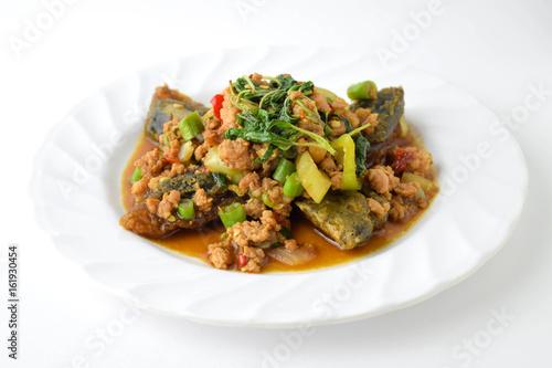 stir fired minced pork with basil top on fired preserved egg.