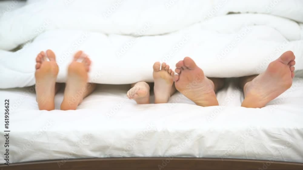 The legs do exercise on the bed The legs do exercise on the bed