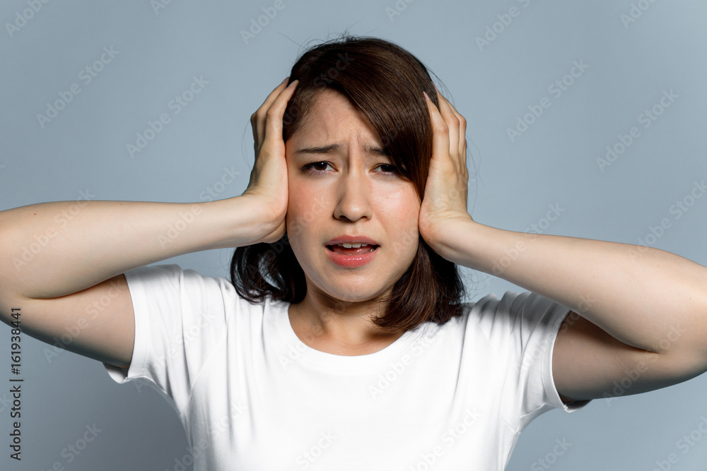 young woman having a headache. young woman having a headache.