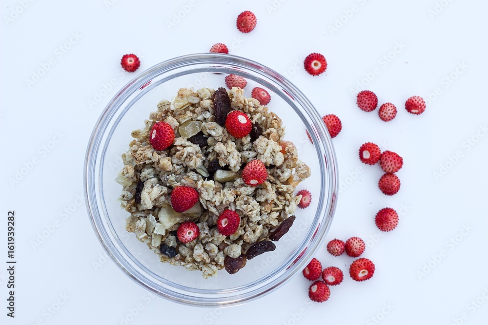 crunchy muesli and fresh wild strawberries crunchy muesli and fresh wild strawberries