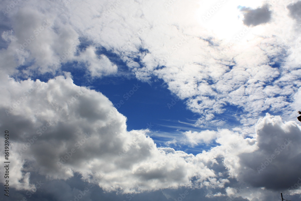 Sky clouds with half sun Sky clouds with half sun