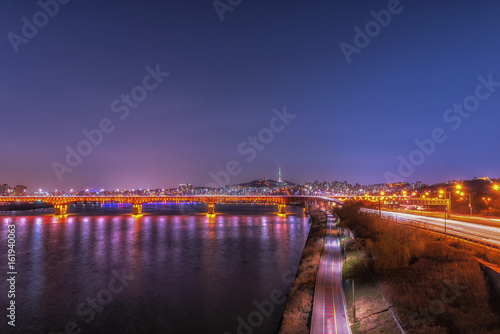  landscape of Hangung River in the evening and Seoul Tower in the night in Seoul, Korea