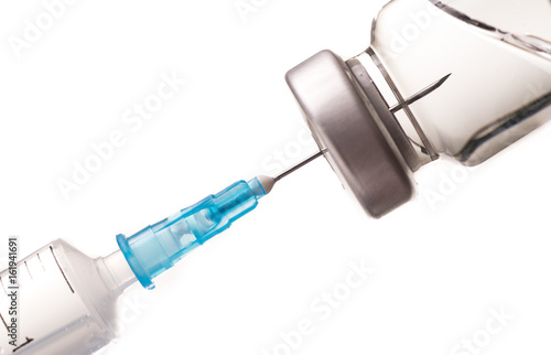 Syringe, needle and medicine vial.