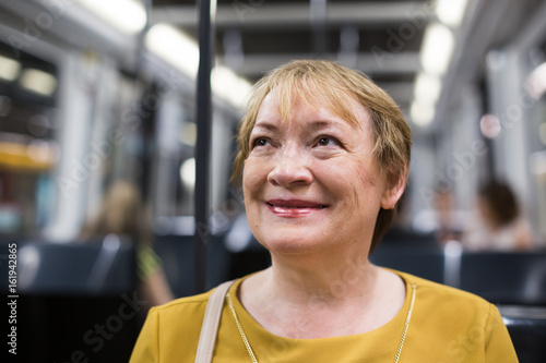 senior woman subway