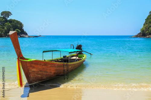 Tropical beach, traditional long tail boats, Andaman Sea, Thailand © oatfeelgood
