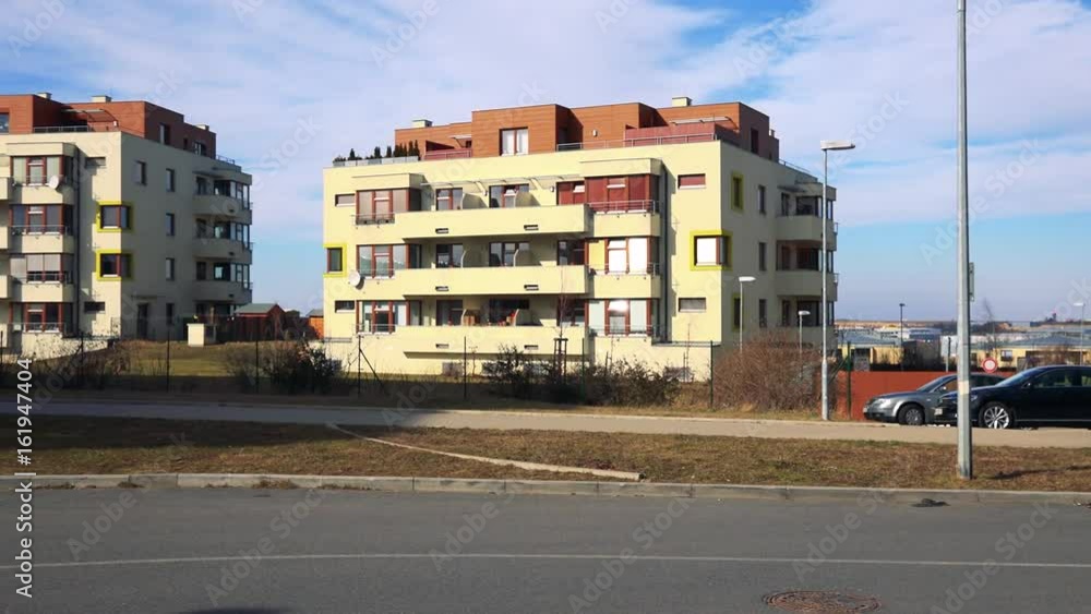 modern housing estate with parked cars (high-rise block of flats) modern housing estate with parked cars (high-rise block of flats)