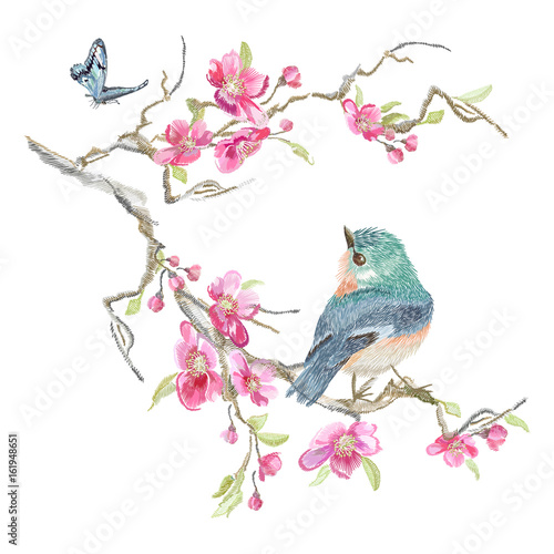 Embroidery floral pattern with oriental cherry blossom and varied tit.