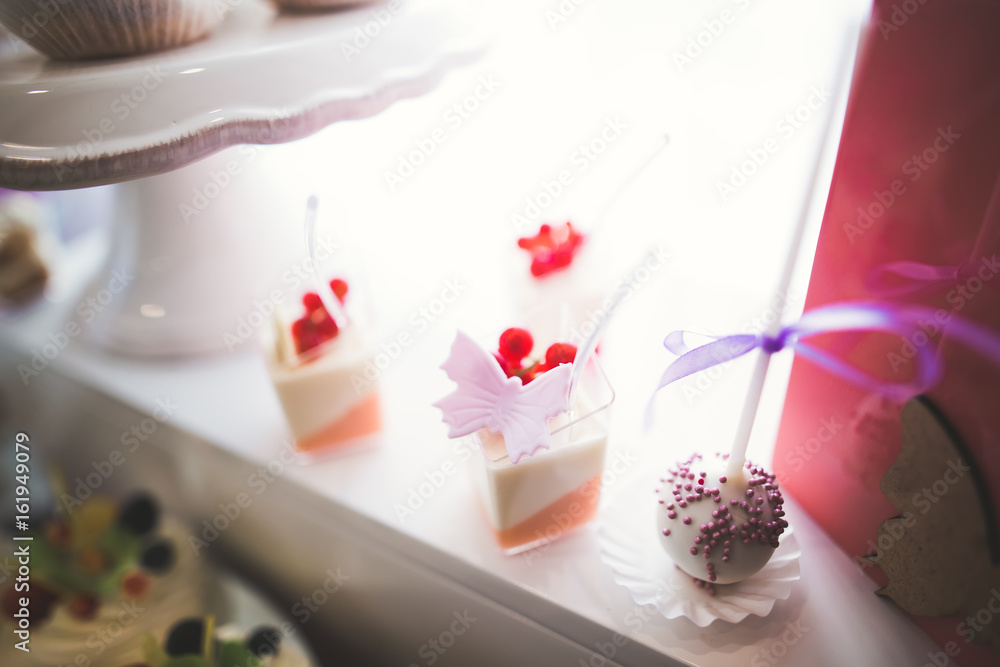 Different kinds of baked sweets on a buffet Different kinds of baked sweets on a buffet