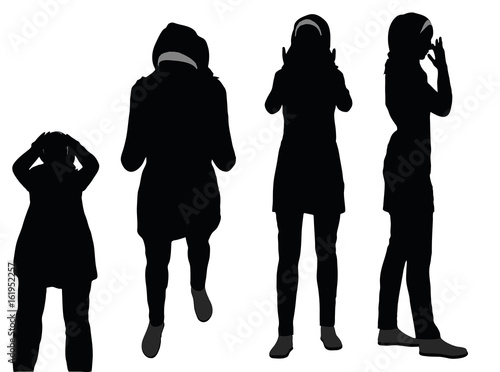 Muslim woman silhouette in pray pose