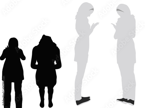 Muslim woman silhouette in pray pose