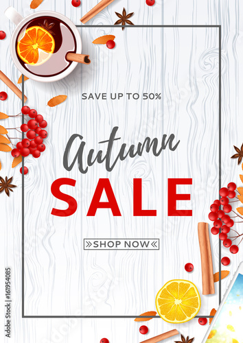 Beautiful flyer for autumn sale. Top view on composition with cup of mulled wine, rowan, cinnamon sticks on wooden texture. Vector illustration.