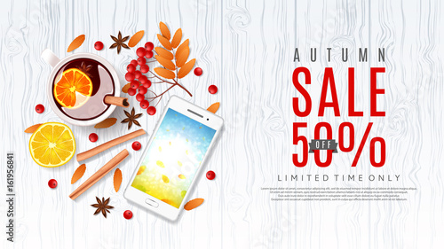 Beautiful web banner with wooden texture for autumn sale. Top view on composition with cinnamon sticks, cup of mulled wine, rowan and orange. Vector illustration.
