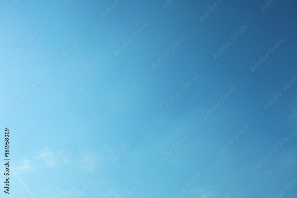clouds in the blue sky. Beautiful Blue Sky Background Template With Some Space for Input Text Message Below Isolated on Blue clouds in the blue sky. Beautiful Blue Sky Background Template With Some Space for Input Text Message Below Isolated on Blue
