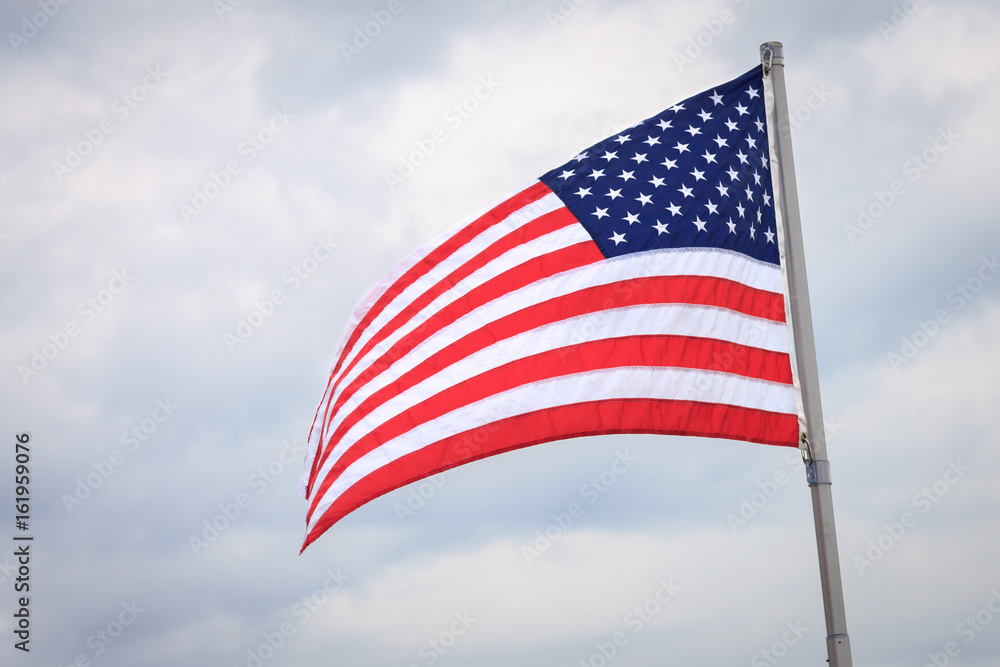 Fototapeta premium American Flag Waving In Wind (horizontal)