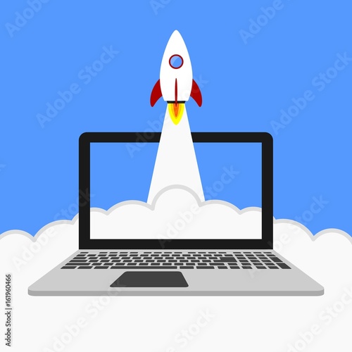 Start up rocket on laptop screen with clouds