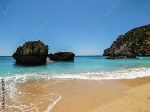 Beautiful beach "Praia da Ribeira do Cavalo" in Sesimbra, Portugal. © Helissa