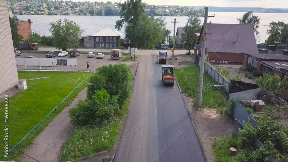 Asphalt laying. Roadwork top view Asphalt laying. Roadwork top view