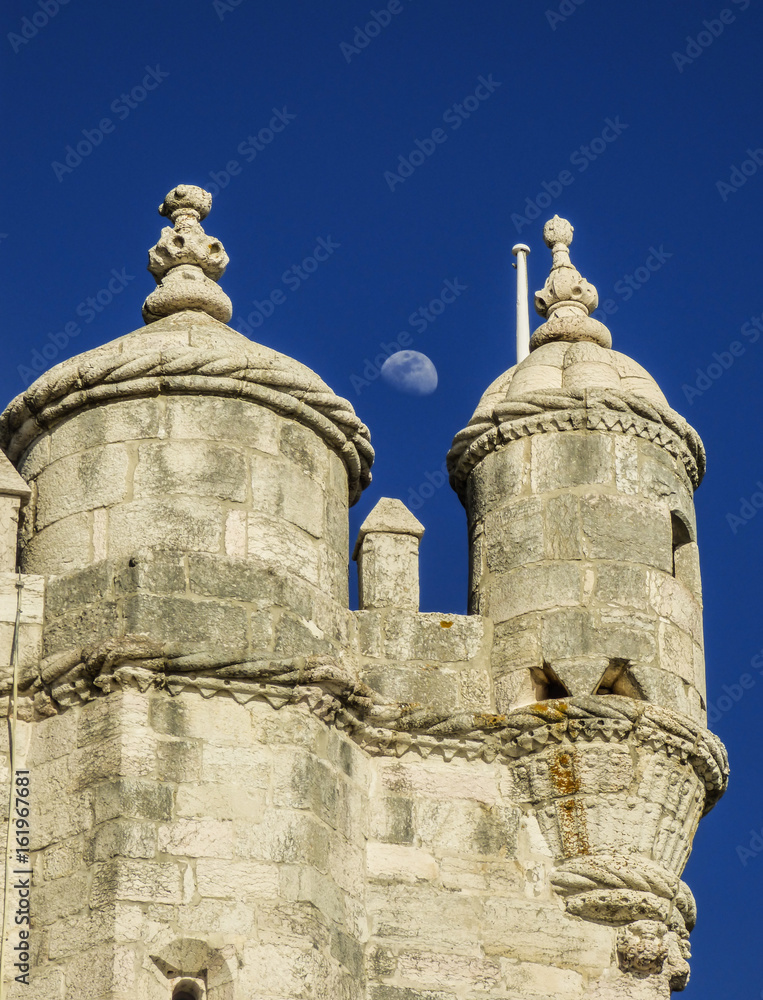Belem tower details and the moon
