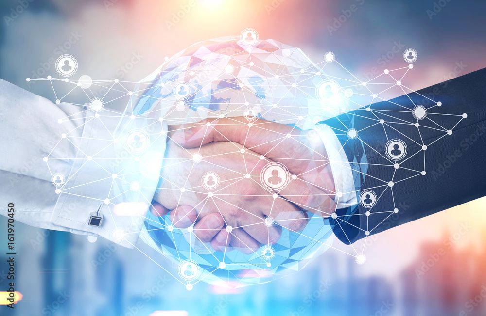Handshake in a city, planet, network close up Handshake in a city, planet, network close up